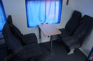 Стол в салоне. Автобус вахтовый КамАЗ  43118 RF