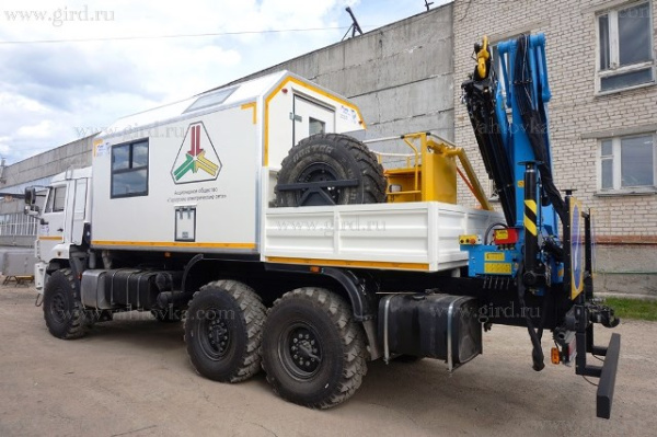 Специальный автомобиль передвижная мастерская на шасси КамАЗ 43118 с КМУ ИМ-95 Специальный автомобиль передвижная мастерская на шасси КамАЗ 43118 с КМУ ИМ-95